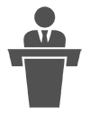 businessman-behind-podium-giving-a-speech